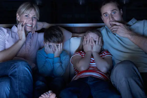 family scared of a horror movie