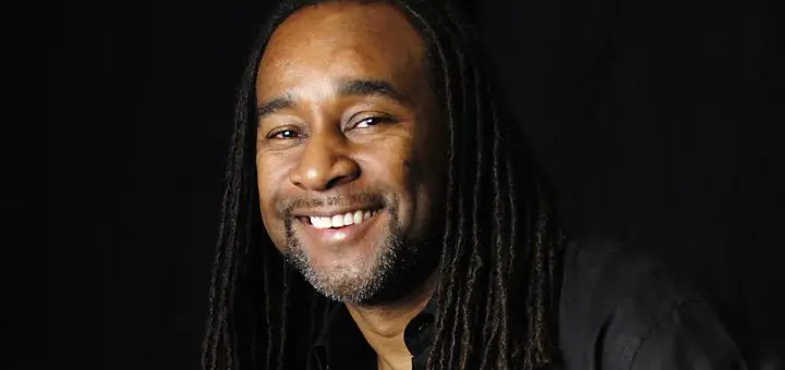 Author Eric Jerome Dickey with a black background
