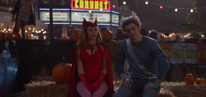 Elizabeth Olsen dressed as classic Scarlet Witch and Evan Peters dressed as classic Quicksilver