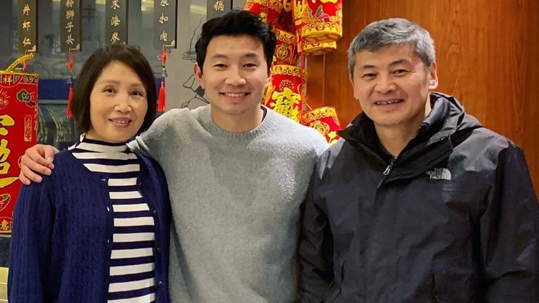 Simu Liu with his parents