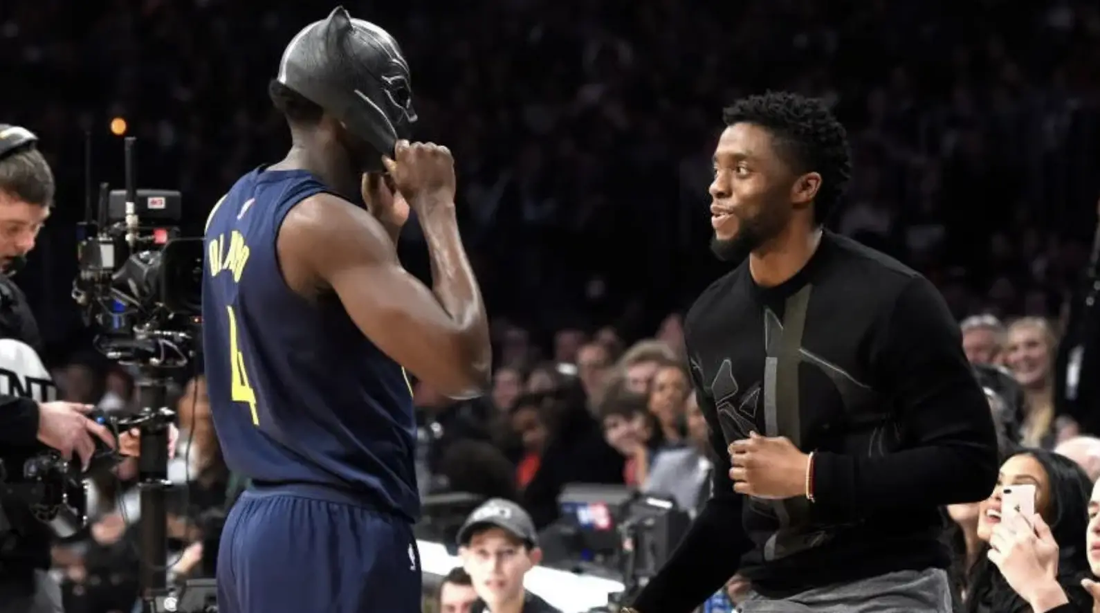 Chadwick Boseman with NBA Player in Black Panther mask