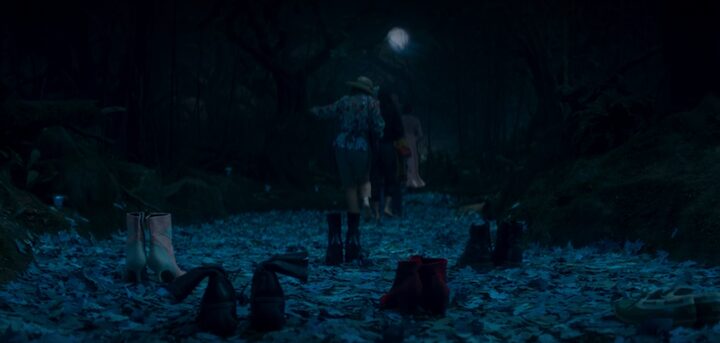 The shoeless Coven walks the Witches' Road in Agatha All Along